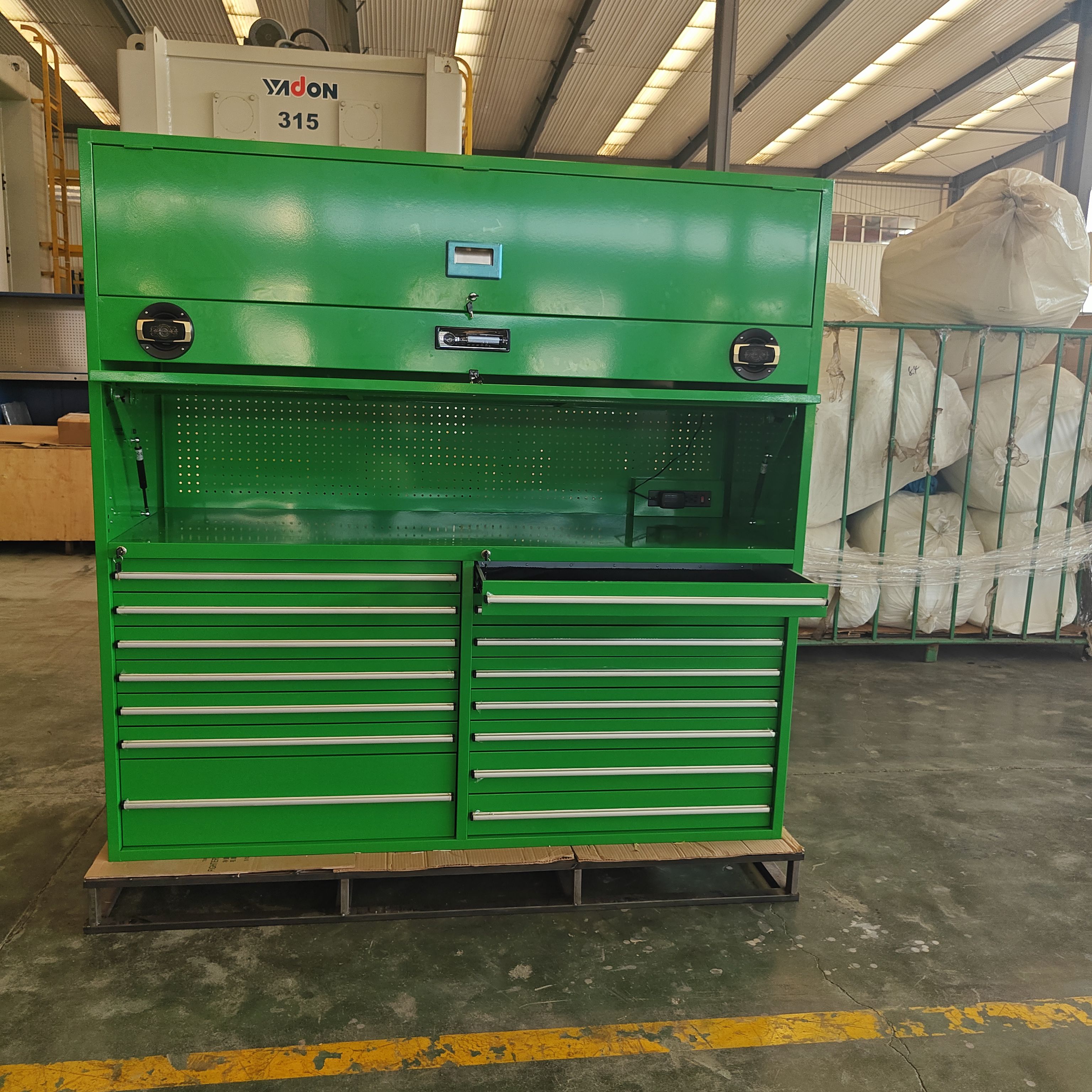 Green tool cabinet with speakers